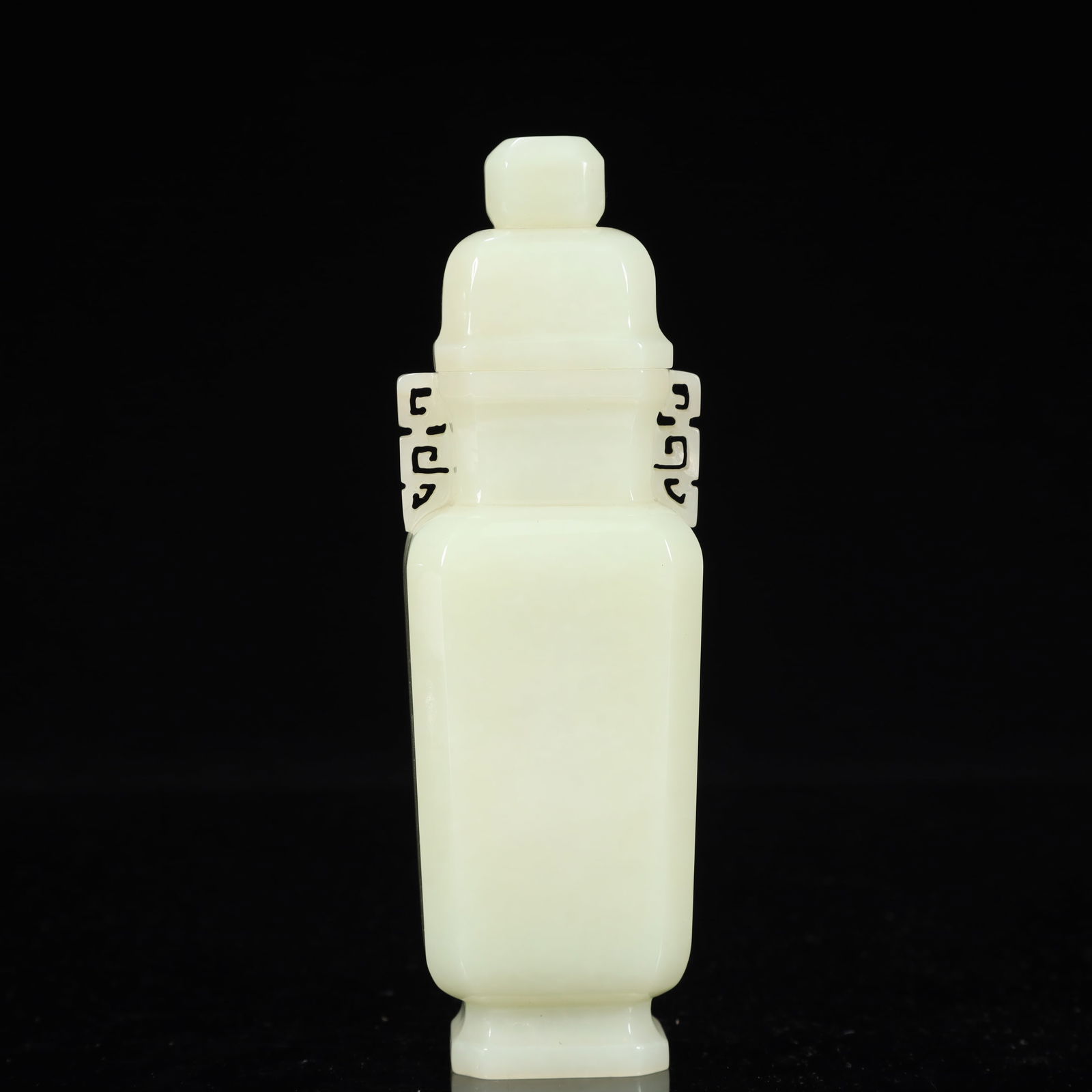 An Exquisite White Jade Double-Ears Bottle: An Exquisite White Jade Double-Ears Bottle,Qing Dynasty, China,Size:2.2inx1.8inx6.7in,Weight:350g 白玉双耳盖瓶,中国清代