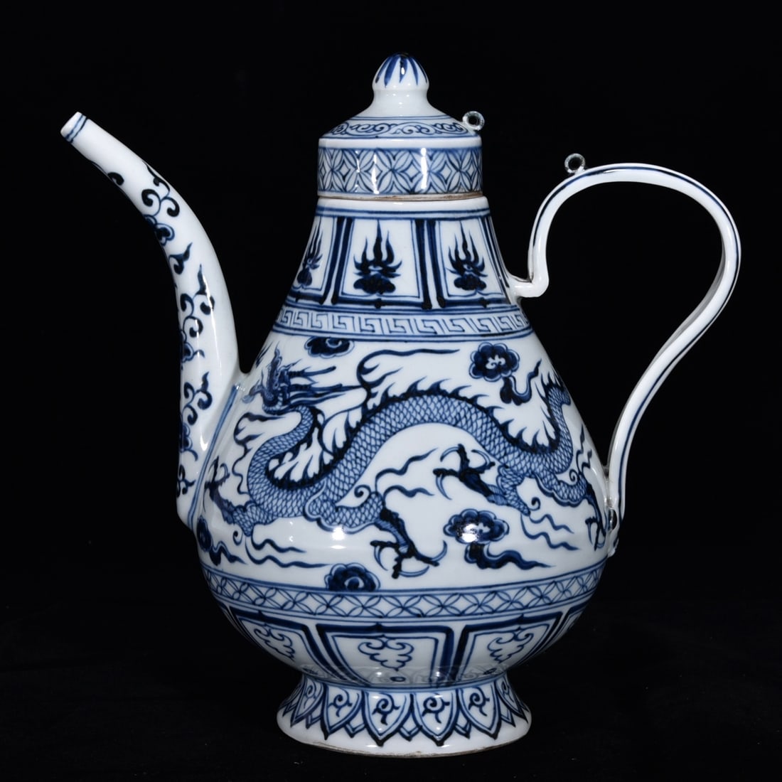 An Exquisite Blue and White Auspicious Cloud and Dragon Pattern Ewer: An Exquisite Blue and White Auspicious Cloud and Dragon Pattern Ewer,Yuan Dynasty, China,Size:9.3inx8.3in 
