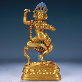 A Solemn Gilt Bronze Statue of Gautama’s Mother