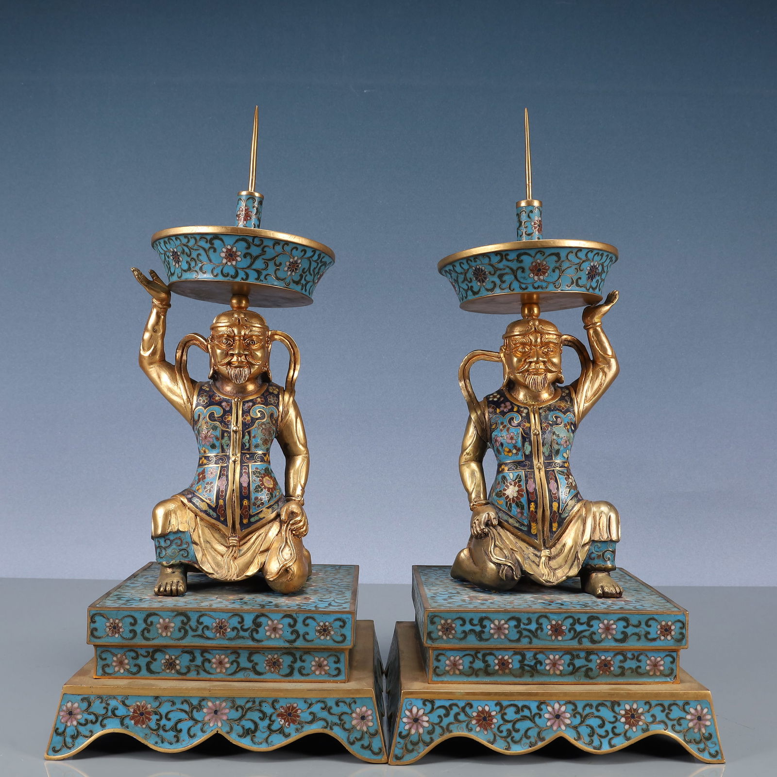 A Pair of Exquisite Cloisonne Lotus Pattern Figure-Shaped Candlesticks: A Pair of Exquisite Cloisonne Lotus Pattern Figure-Shaped Candlesticks,Qing Dynasty, China,Size:8.1inx15.7in,Weight:6600g 一对景泰蓝缠枝莲纹ߟ