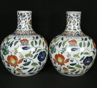 A Pair of Rare Blue and White Wucai Lotus Pattern Vases