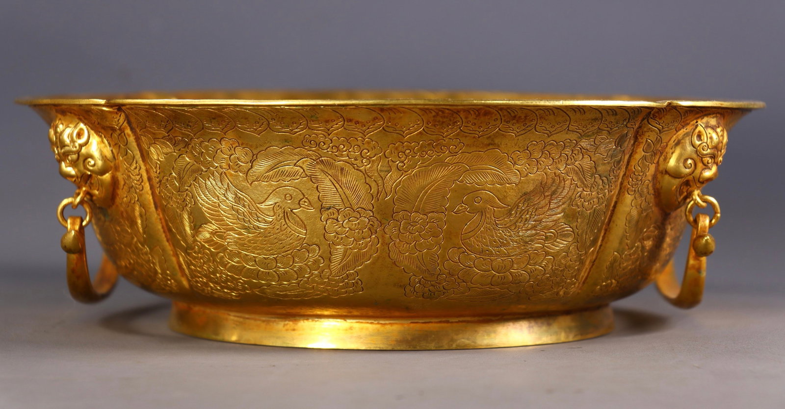 An Exquisite Gilt Bronze Flower and Bird Pattern Beast-Ears Basin (1 of 9)