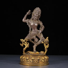 A Solemn Gilt-bronze and silver Statue of Dakini