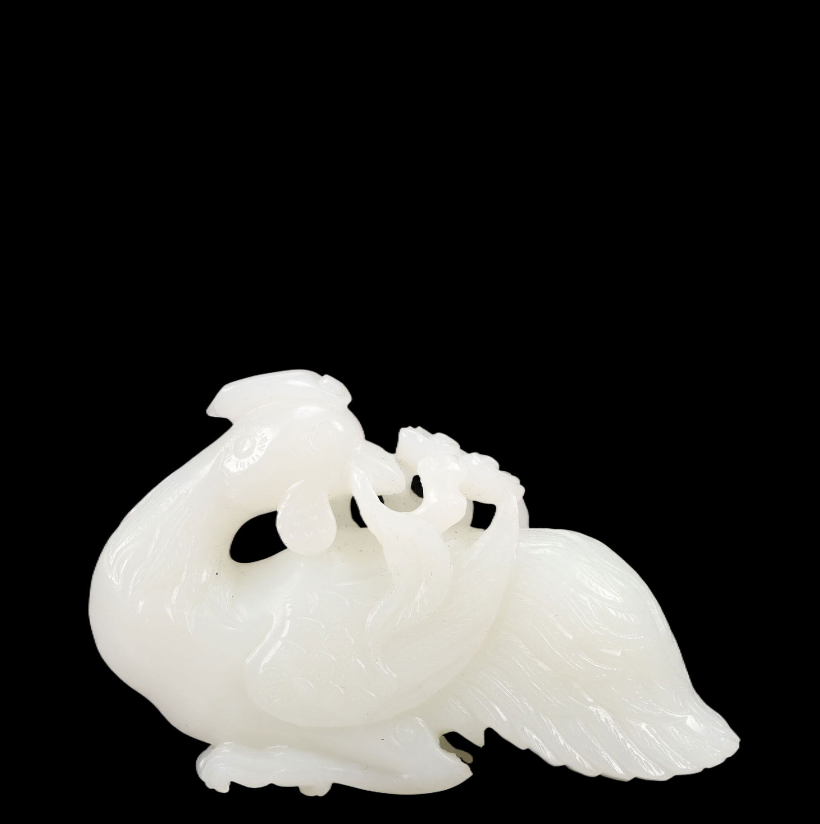 An Exquisite White Jade Rooster Ornament: An Exquisite White Jade Rooster Ornament, Qing Dynasty, China, Size:3.5inx0.8inx2.2in, Weight:126g 精美的白玉公鸡摆件,中国清