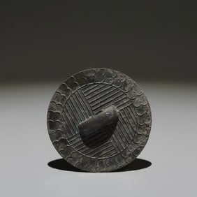 An Archaic Bronze Round Mirror