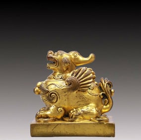 A Solemn Gilt Bronze Auspicious Beast Ornament