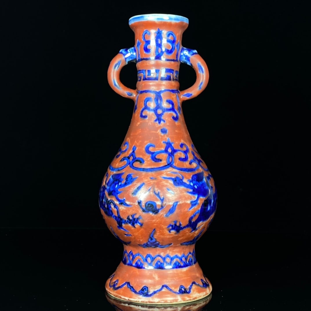 An Exquisite Red Ground Blue and White Auspicious Cloud and Dragon Pattern Double-Ears Vase: An Exquisite Red Ground Blue and White Auspicious Cloud and Dragon Pattern Double-Ears Vase,Ming Dynasty, China,Jiajing Six-character Mark,Size:8inx3.5in 