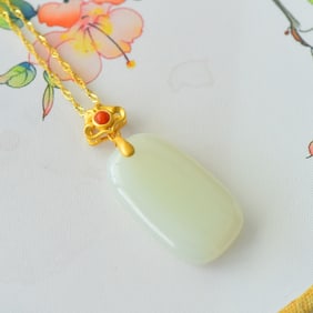 An Exquisite Sterling Silver-Gold Plated Inlaid White Jade Pendant