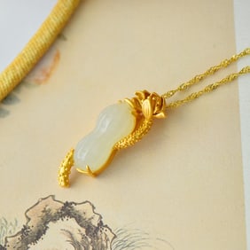 An Exquisite Sterling Silver-Gold Plated Inlaid White Jade Pendant