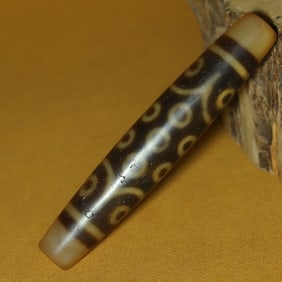 An Exquisite Twenty-one Eyes Dzi Bead Pendant