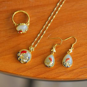 A Set of Fine Sterling Silver-Gold Plated Inlaid White Jade Jewelrys
