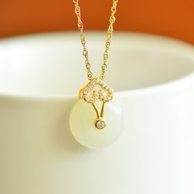 An Exquisite Sterling Silver-Gold Plated Inlaid White Jade Pendant
