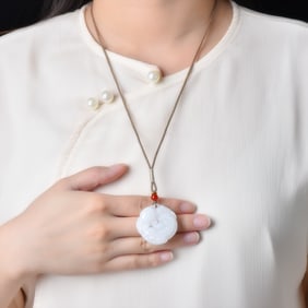 An Exquisite White Jade Auspicious Beast Pendant
