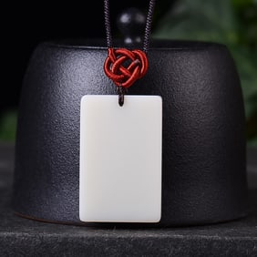 An Exquisite White Jade Pendant