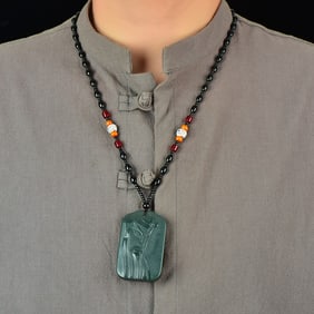 An Exquisite Sapphire Guangong and Dragon Pattern Pendant