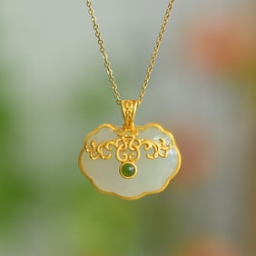 An Exquisite Sterling Silver-Gold Plated Inlaid White Jade Pendant