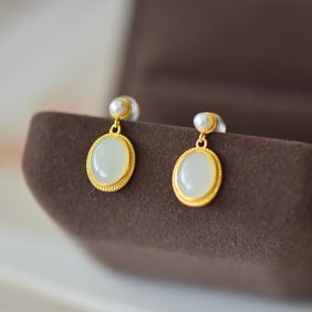 A Pair of Exquisite Sterling Silver-Gold Plated Inlaid White Jade Earrings