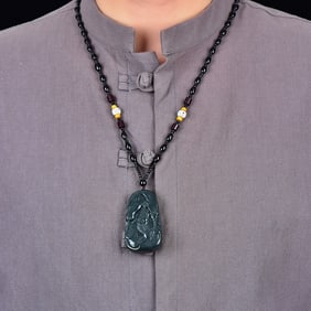 An Exquisite Sapphire Guangong and Horse Pattern Pendant