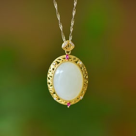 An Exquisite Sterling Silver-Gold Plated Inlaid White Jade Pendant