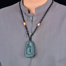 An Exquisite Sapphire Avalokitesvara Pattern Pendant