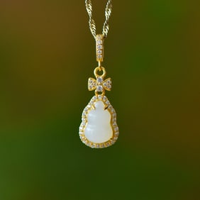 An Exquisite Sterling Silver-Gold Plated Inlaid White Jade Pendant