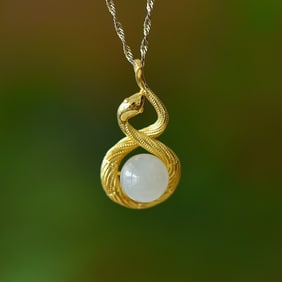 An Exquisite Sterling Silver-Gold Plated Inlaid White Jade Pendant