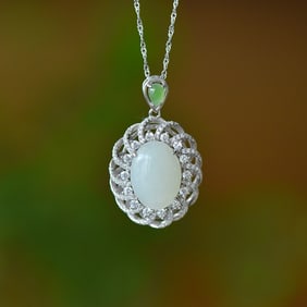 An Exquisite Sterling Silver Inlaid White Jade Pendant