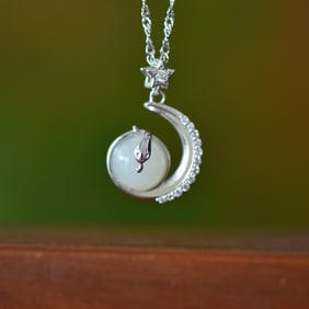 An Exquisite Sterling Silver Inlaid White Jade Pendant