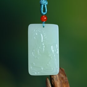 An Exquisite White Jade Horse Pattern Pendant