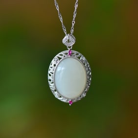 An Exquisite Sterling Silver Inlaid White Jade Pendant