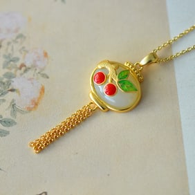 An Exquisite Sterling Silver-Gold Plated Inlaid White Jade Pendant