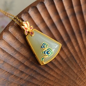 An Exquisite Sterling Silver-Gold Plated Inlaid White Jade Pendant