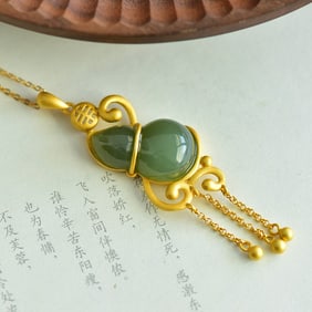 An Exquisite Sterling Silver-Gold Plated Inlaid Sapphire Pendant