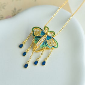 An Exquisite Sterling Silver-Gold Plated Inlaid White Jade Pendant