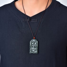 An Exquisite Sapphire Guangong and Dragon Pattern Pendant