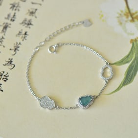 An Exquisite Sterling Silver Inlaid Jadeite Bracelet