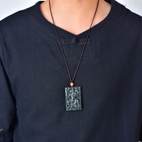 An Exquisite Sapphire Guangong and Dragon Pattern Pendant