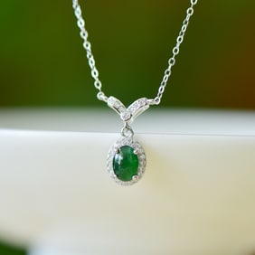 An Exquisite Sterling Silver Inlaid Jadeite Pendant