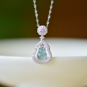 An Exquisite Sterling Silver Inlaid Jadeite Pendant