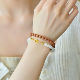 An Exquisite White Jade Eaglewood Bracelets