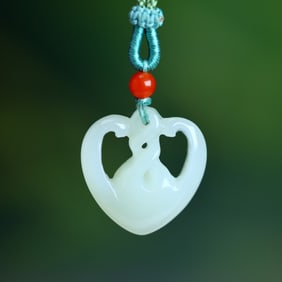 An Exquisite White Jade Pendant