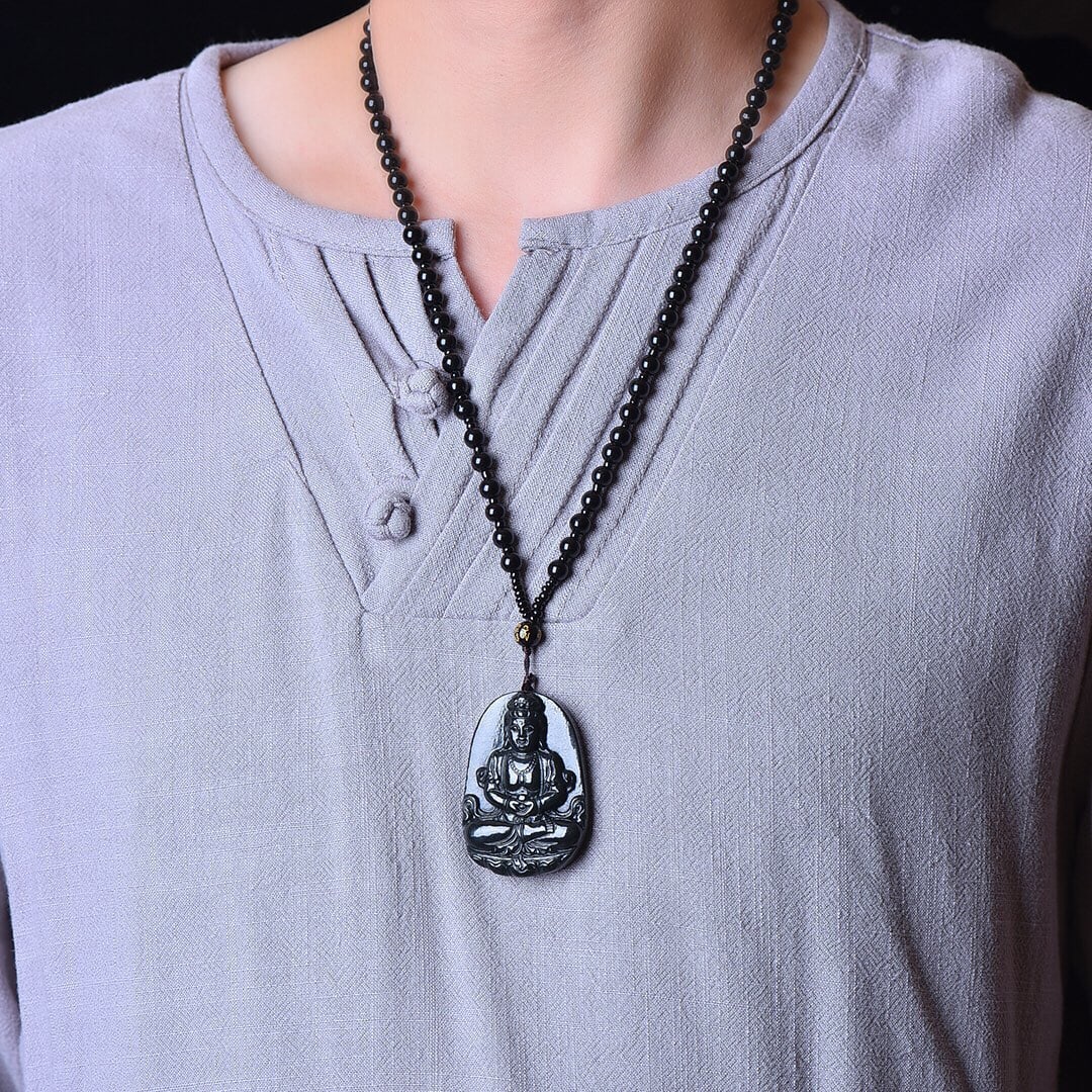 An Exquisite Sapphire Avalokitesvara Pattern Pendant: An Exquisite Sapphire Avalokitesvara Pattern Pendant,Size:55mmx39mm 青玉观音像纹挂件