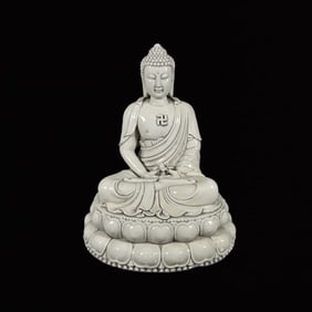 A Solemn Blance-De-Chine Statue of Sakyamuni