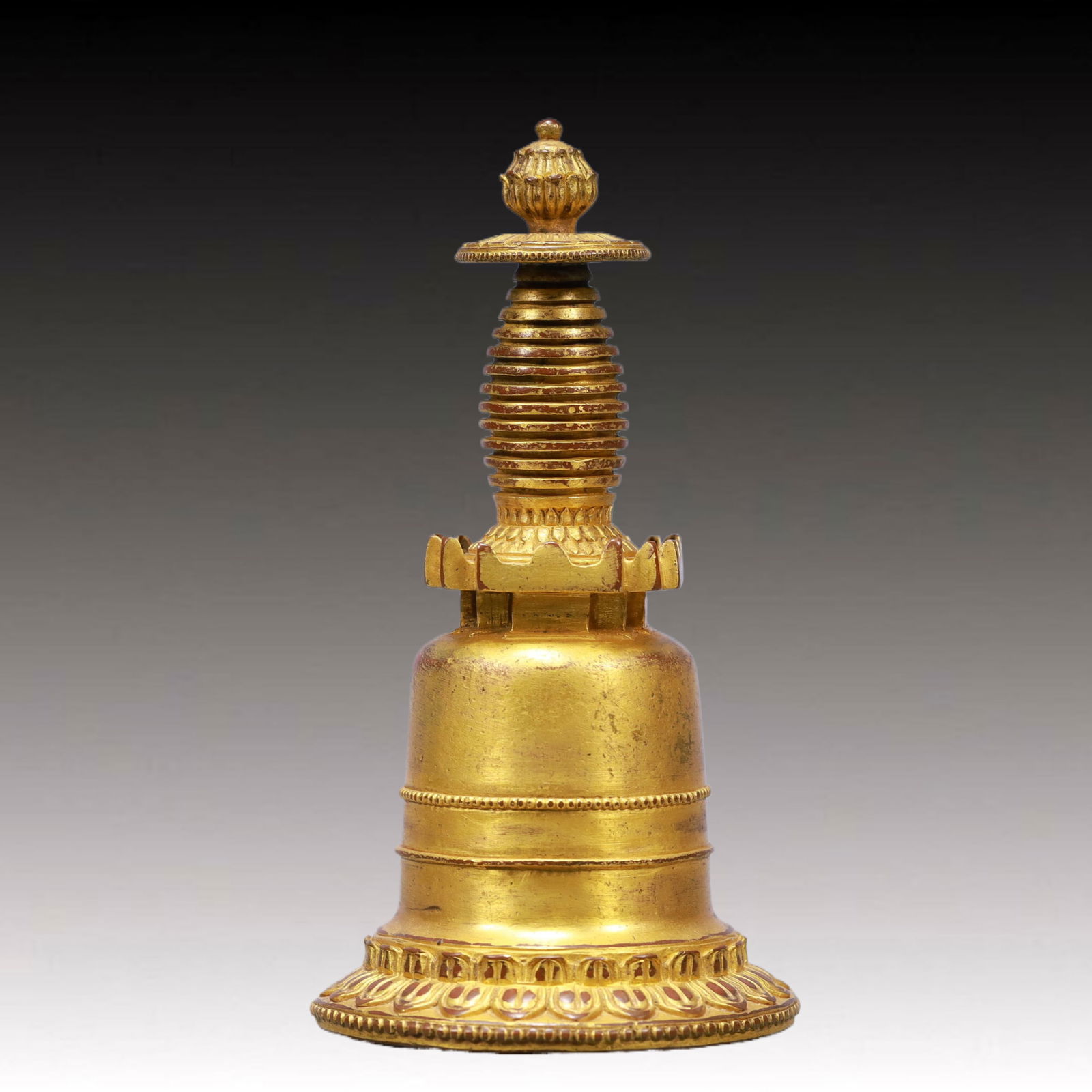 An Exquisite Gilt Bronze Pagoda: An Ecmxquisite Gilt Bronze Pagoda ,Qing Dynasty, China,Size:5.9inx3.1inWeight:500g 铜鎏金佛塔,中国清代