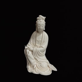 A Solemn Blance-De-Chine Statue of Avalokitesvara
