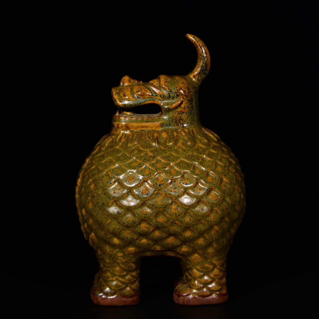 A Rare Teadust Glazed Auspicious Beast Ornament: A Rare Teadust Glazed Auspicious Beast Ornament,Qing Dynasty,China,Size:12.6inx8.3in 茶叶末釉瑞兽摆件,中国清代