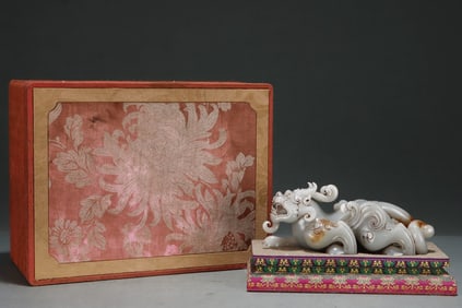 An Exquisite White Jade Auspicious Beast Ornament