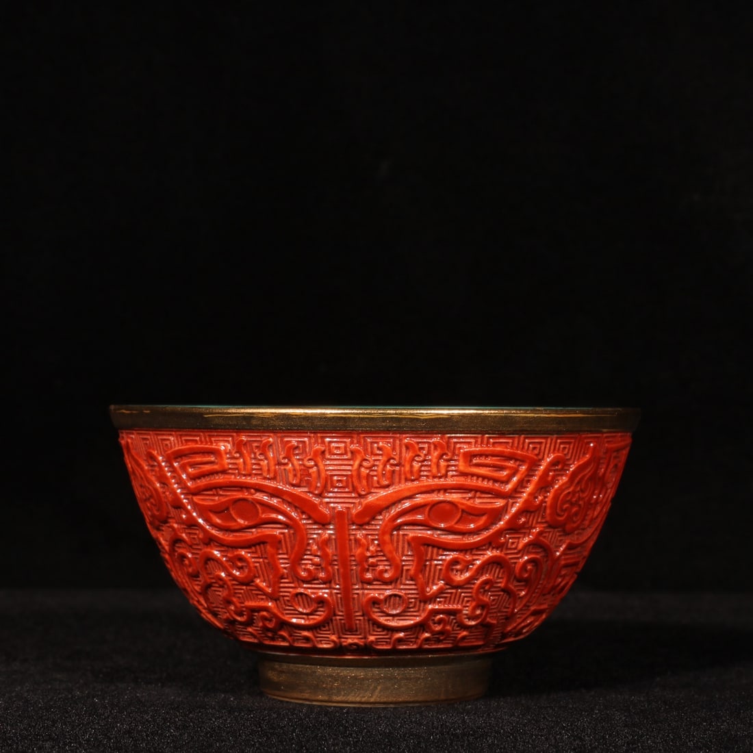 An Exquisite Coral Red Glazed Beast-Face Pattern Bowl: An Exquisite Coral Red Glazed Beast-Face Pattern Bowl,Qing Dynasty,China,Yongzheng Four-Character Mark,Size:2inx3.5in 珊瑚红釉兽面纹碗,中国&