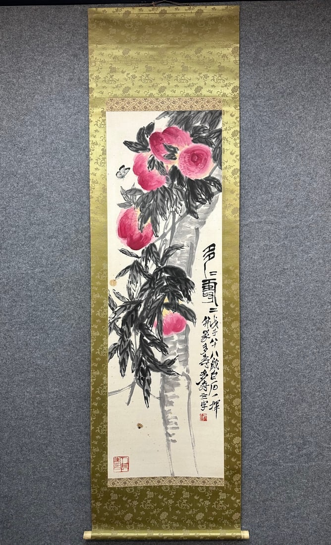 A Chinese Vertical Scroll Ink Painting of Peach on Paper: A Chinese Vertical Scroll Ink Painting of Peach on Paper,Qi Baishi,Size:52inx16.5in 一幅中国水墨桃子画立轴,齐白石