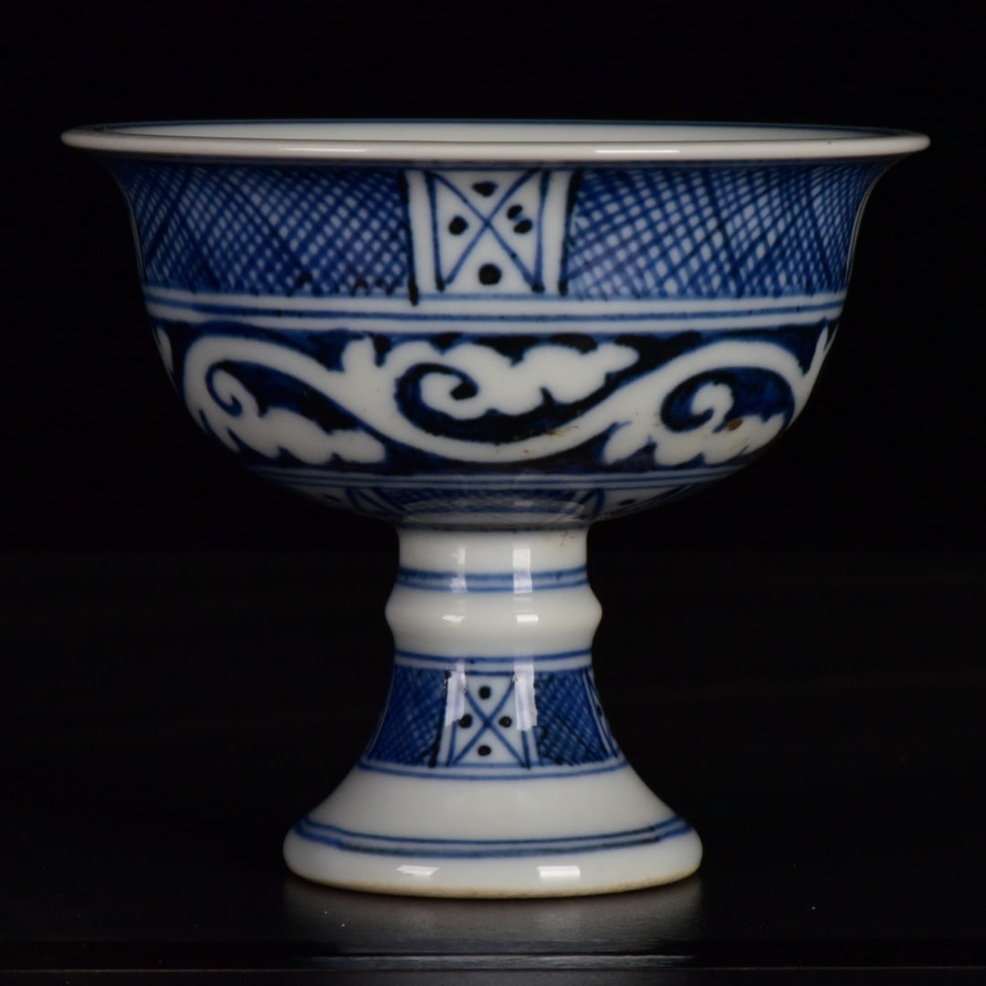 An Exquisite Blue and White Auspicious Cloud Pattern Stem Cup: An Exquisite Blue and White Auspicious Cloud Pattern Stem Cup,Ming Dynasty,China,Xuande Six-Character Mark,Size:2.8inx3.3in 